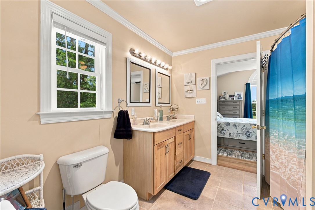 197 Goshen Road Cumberland, VA 23040 - Photo 27 of 70 Neutral-toned bathroom featuring a dual vanity wit