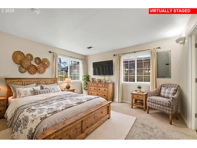 a bed room with a bed and a couch