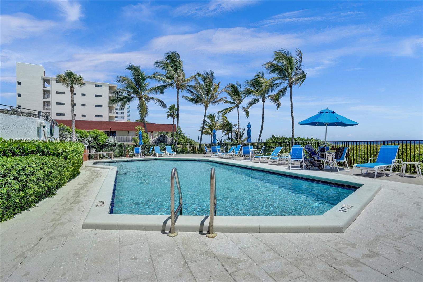 1500 North Ocean Boulevard, Unit 801 Pompano Beach, FL 33062 - Photo 2 of 58 a view of swimming pool with outdoor seating and plants