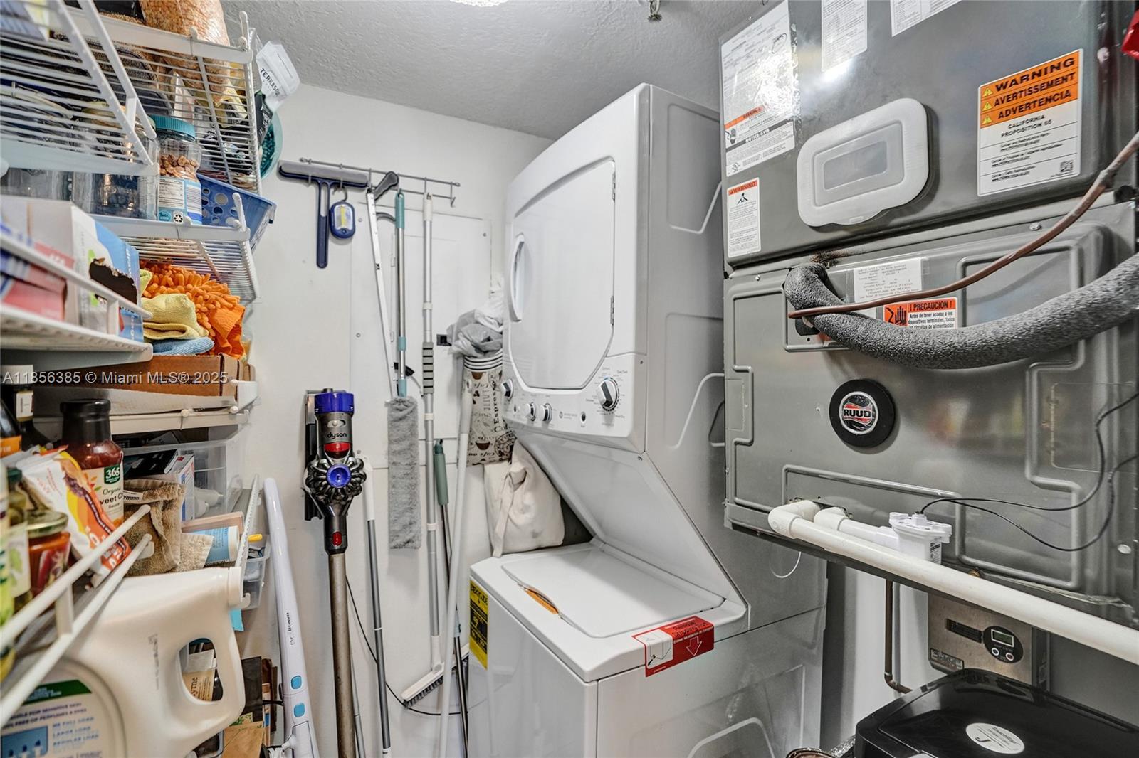 1500 North Ocean Boulevard, Unit 801 Pompano Beach, FL 33062 - Photo 41 of 58 a view of storage and utility room with racks on the wall
