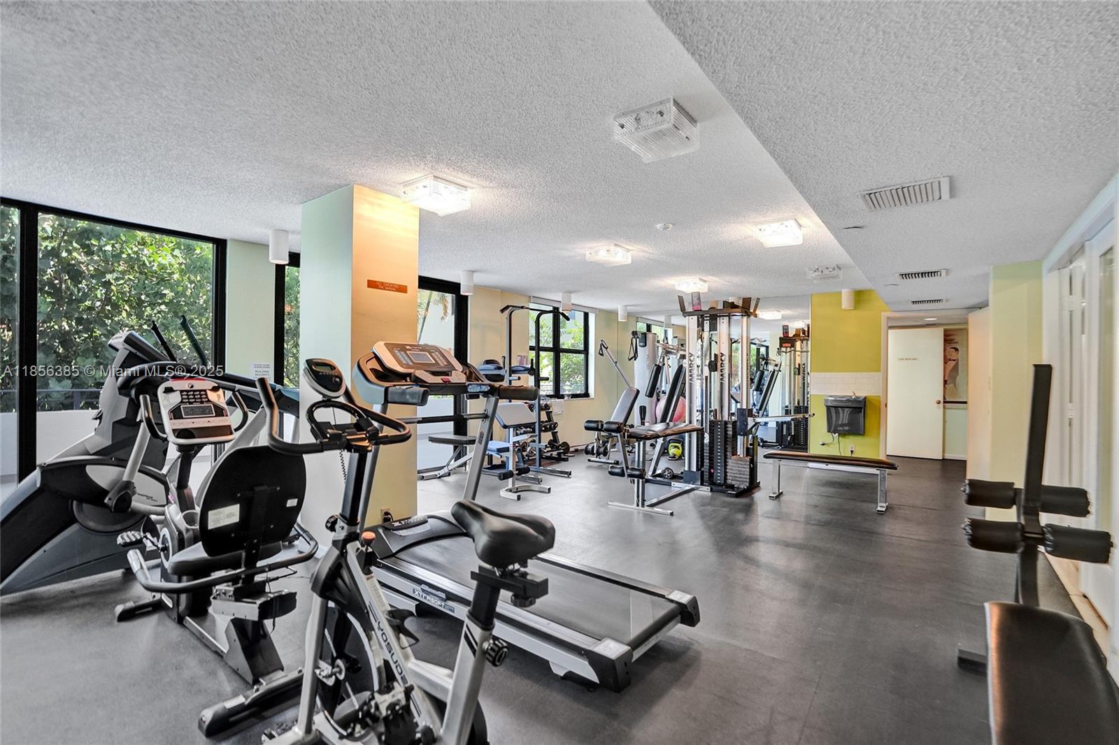 1500 North Ocean Boulevard, Unit 801 Pompano Beach, FL 33062 - Photo 48 of 58 a view of a room with gym equipment