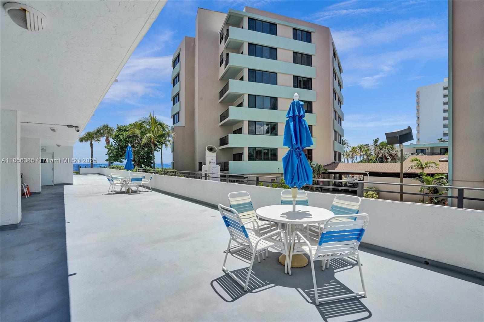 1500 North Ocean Boulevard, Unit 801 Pompano Beach, FL 33062 - Photo 52 of 58 a view of a building with sitting area