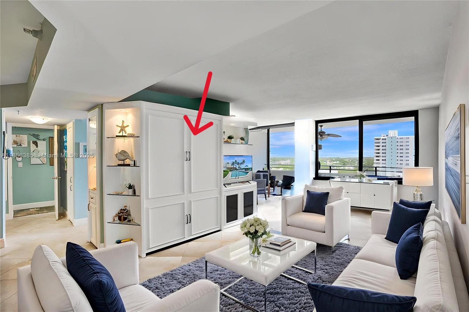 1500 North Ocean Boulevard, Unit 801 Pompano Beach, FL 33062 - Photo 6 of 58 a living room with furniture and a large window