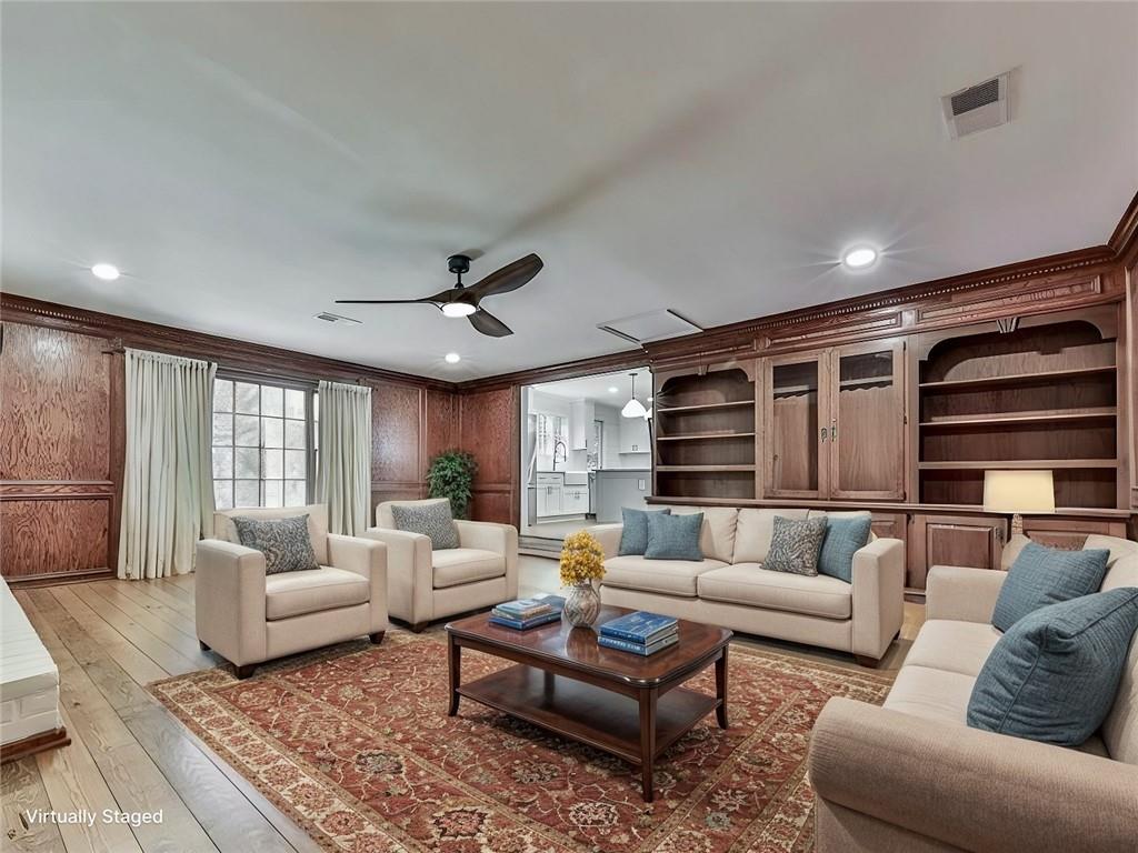 633 Butterworth Road Canton, GA 30114 - Photo 17 of 55 a living room with furniture and a large window