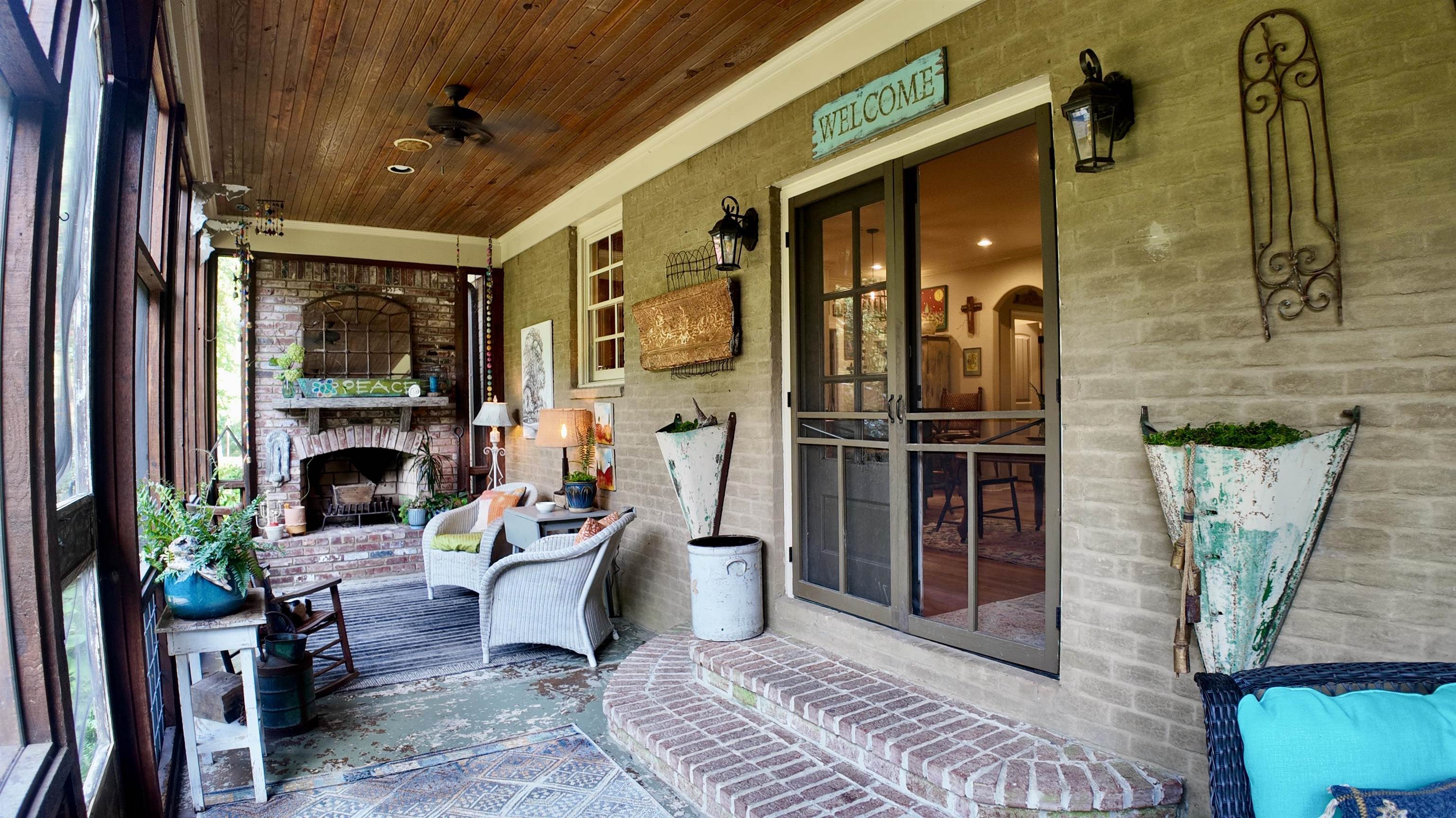 4768 Holly Grove Road Brighton, TN 38011 - Photo 28 of 40 The Screened Back Porch also features a wood-burning fireplace...the perfect place for cool weather get-togethers!