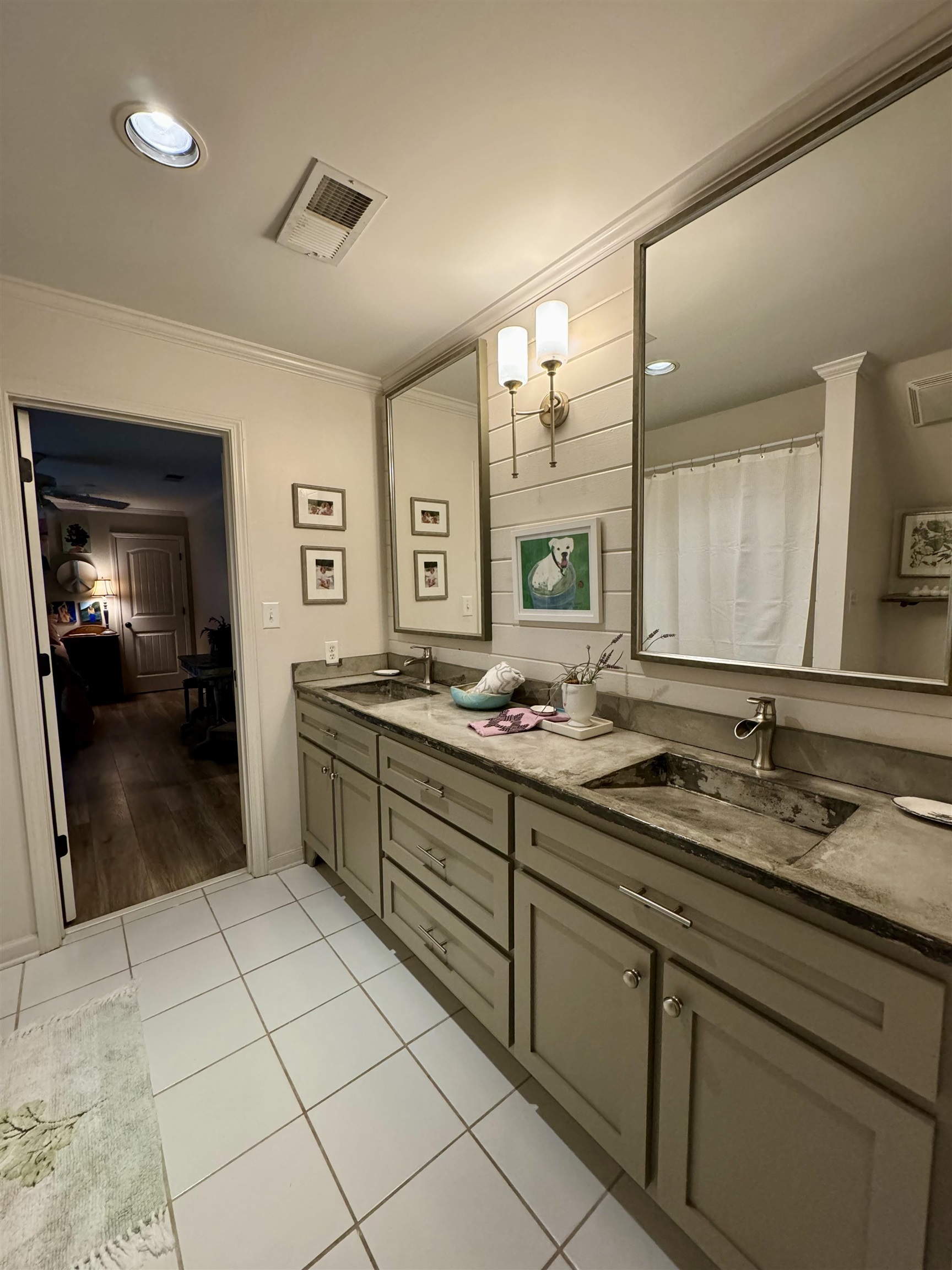 4768 Holly Grove Road Brighton, TN 38011 - Photo 32 of 40 This full bath, with concrete vanity top, joins Bedrooms 2 & 3.