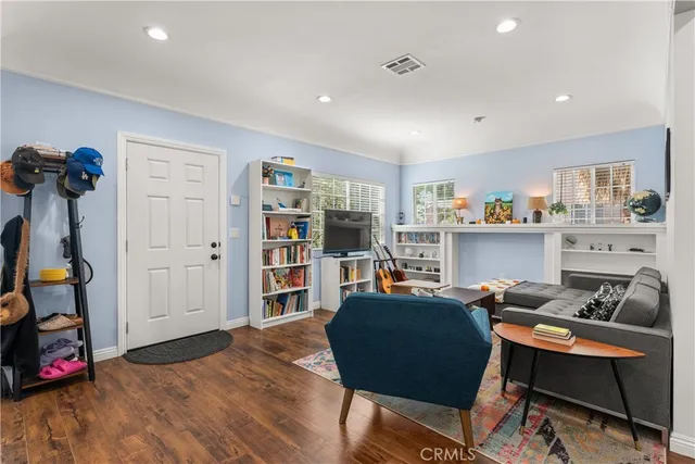 a view of a workspace with furniture and bedroom