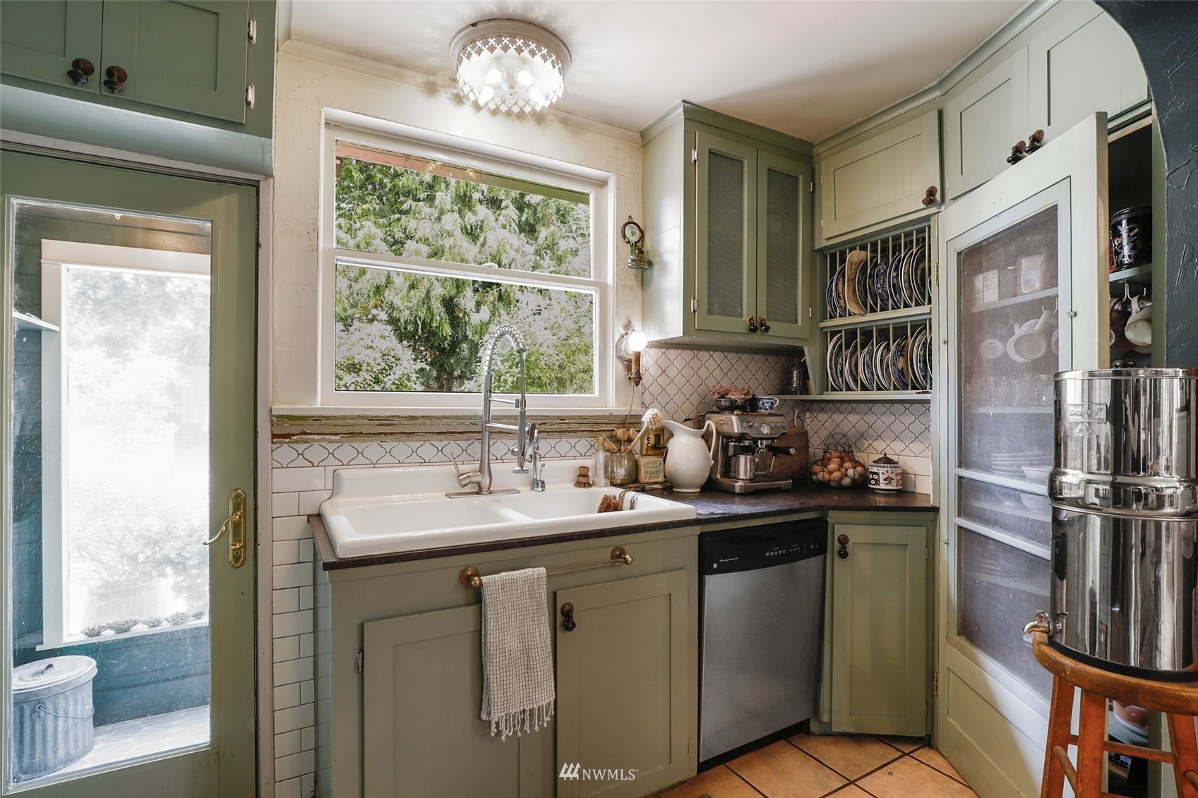 1010 South Director Street Seattle, WA 98108 - Photo 14 of 40 a kitchen with a sink and a window