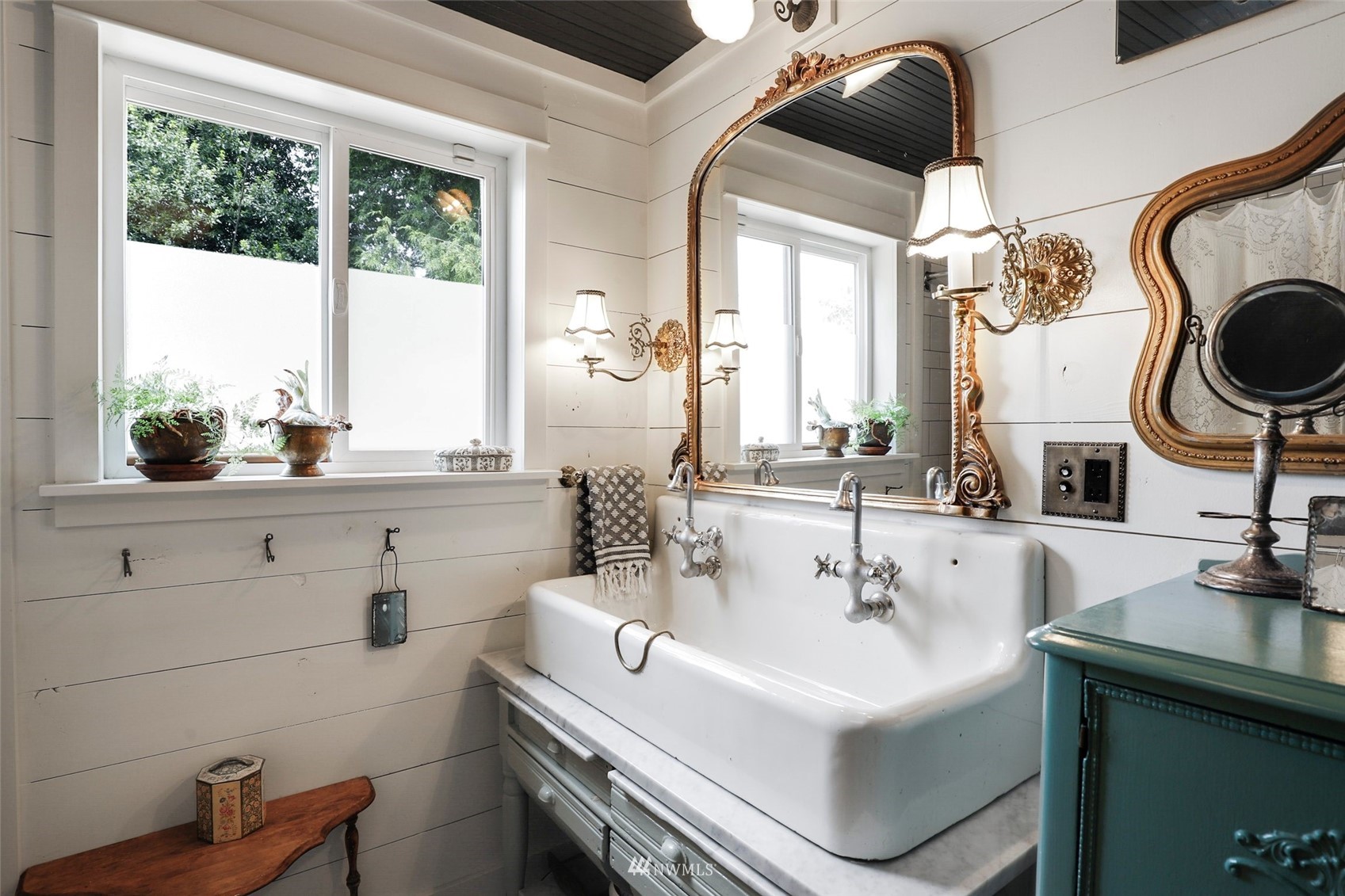 1010 South Director Street Seattle, WA 98108 - Photo 16 of 40 a bathroom with a sink and a vanity