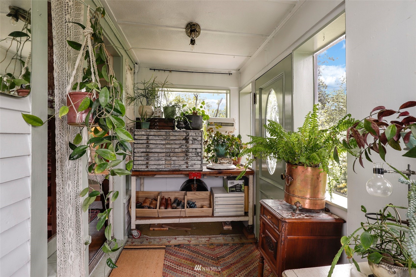 1010 South Director Street Seattle, WA 98108 - Photo 4 of 40 a living room with furniture and a potted plant