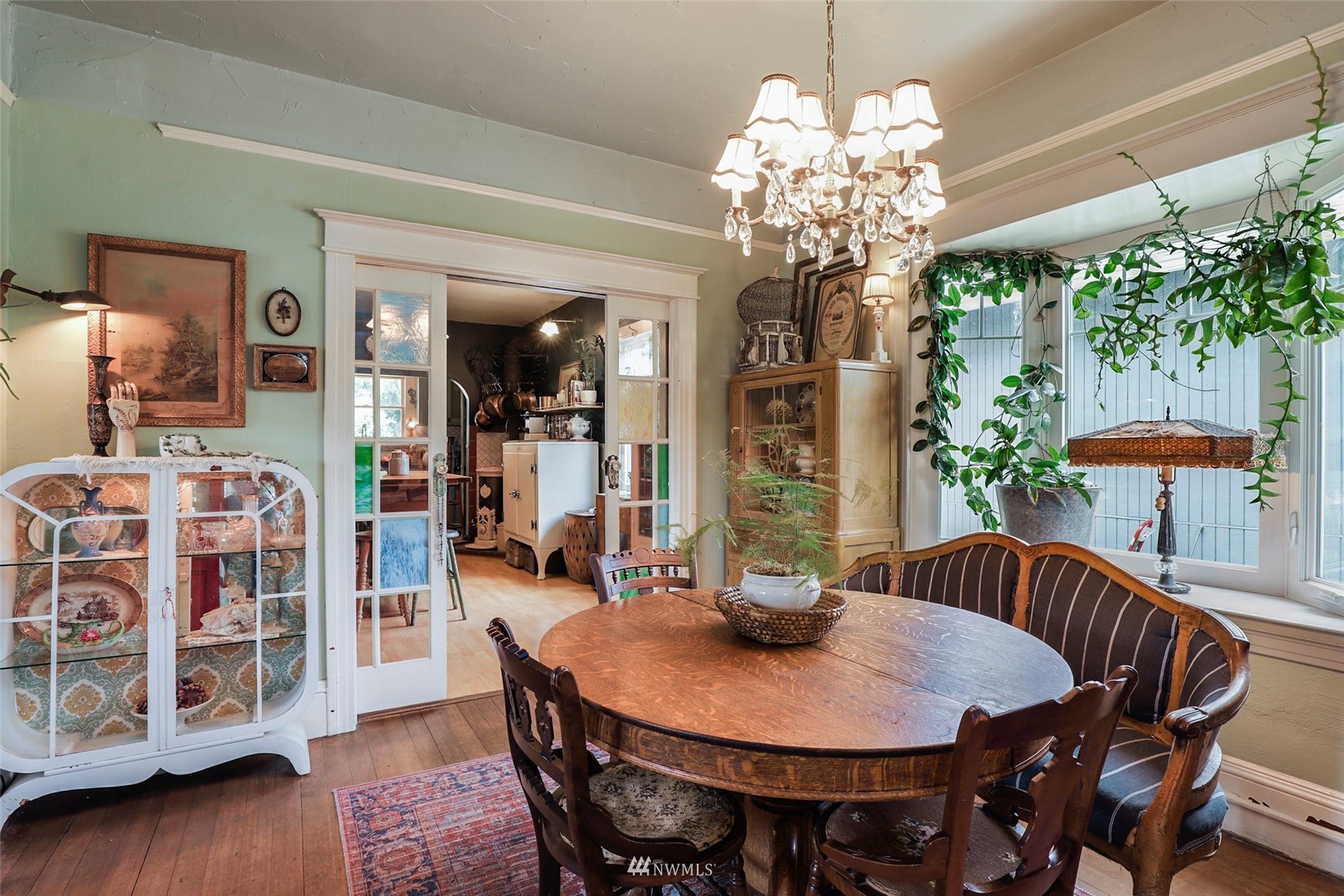 1010 South Director Street Seattle, WA 98108 - Photo 7 of 40 a view of a dining room with furniture and wooden floor
