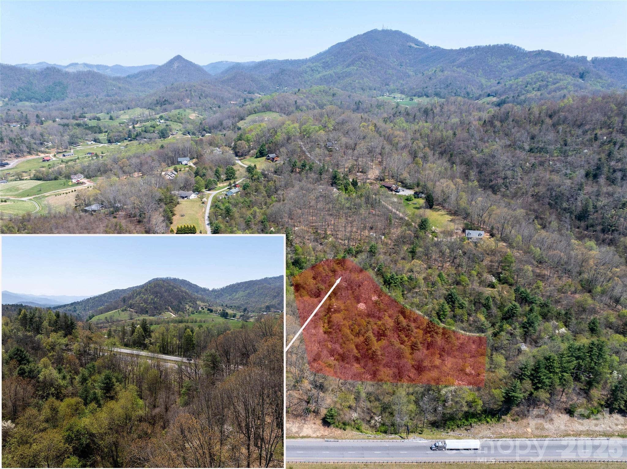 Lot 42 Sunnybrook Trail Clyde, NC 28721 - Photo 2 of 10 an aerial view of a house with a mountain in the background