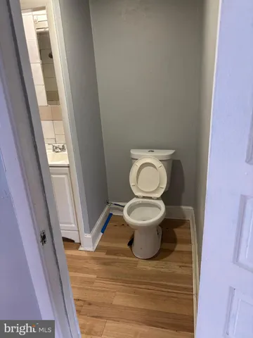 a bathroom with a toilet and a sink