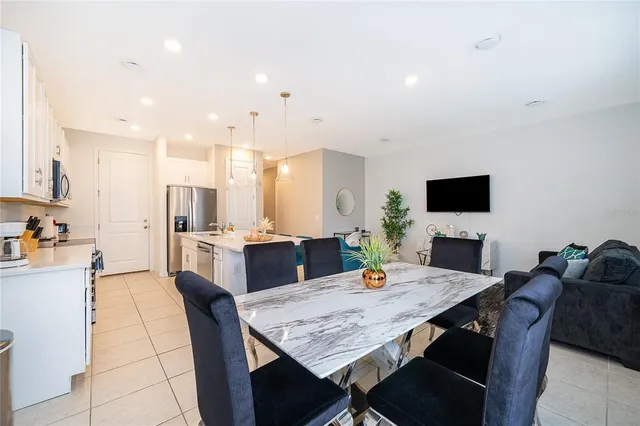 a view of a dining room with furniture