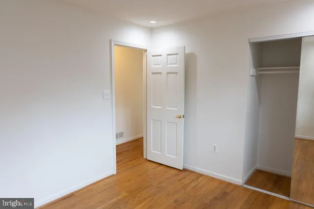 a bathroom with a sink a mirror and shower