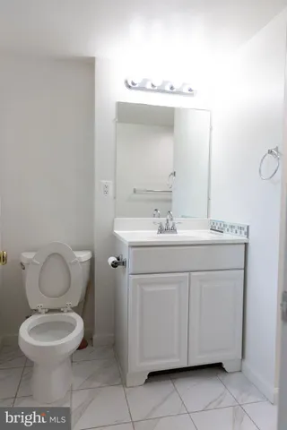 a living room with a couch and a window