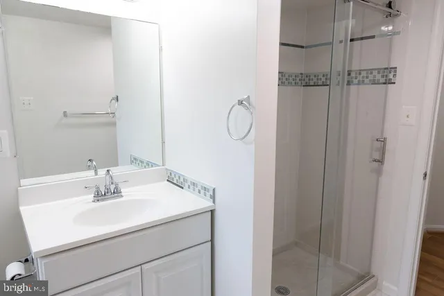 a view of a storage & utility room with a window