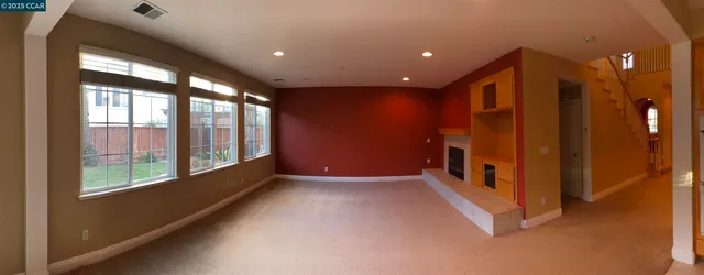 a view of hallway with a large window