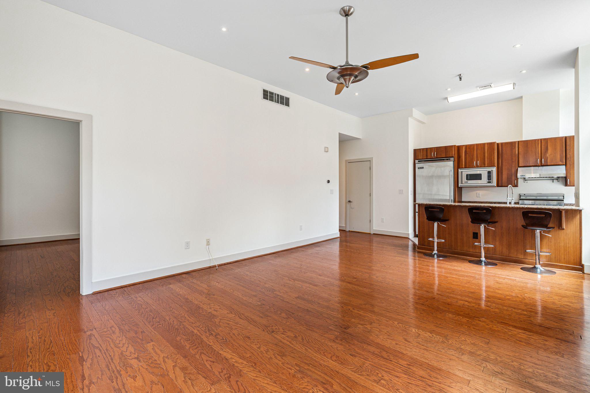 23 South 23rd Street, Unit 2L Philadelphia, PA 19103 - Photo 7 of 34 Kitchen/Dining/Living Area