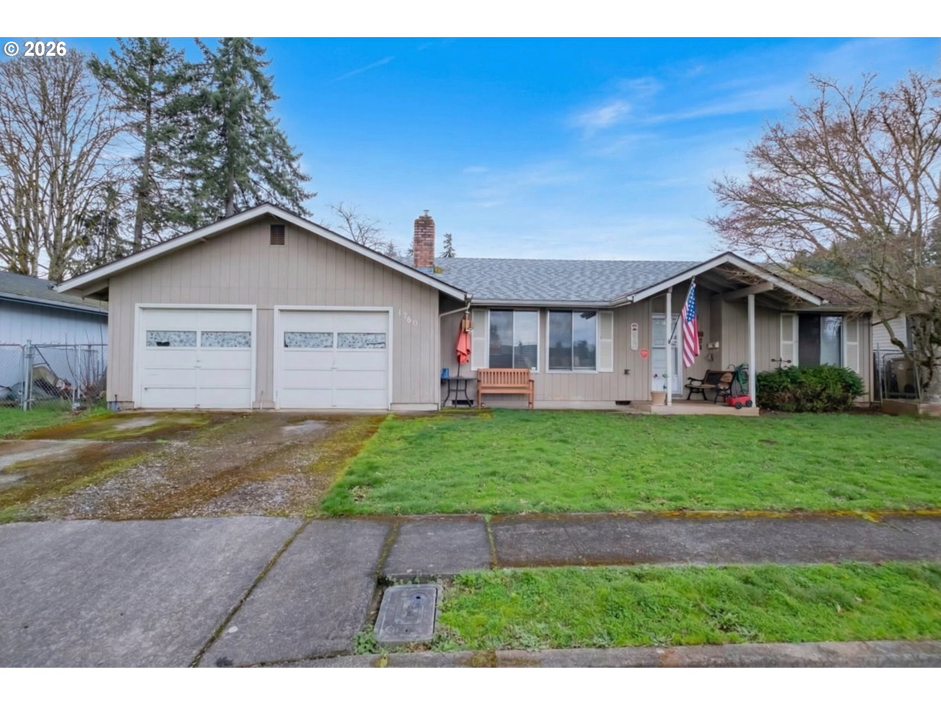1360 Sunset Lane Sweet Home, OR 97386 - Photo 1 of 26 a view of a yard in front of a house with a large tree