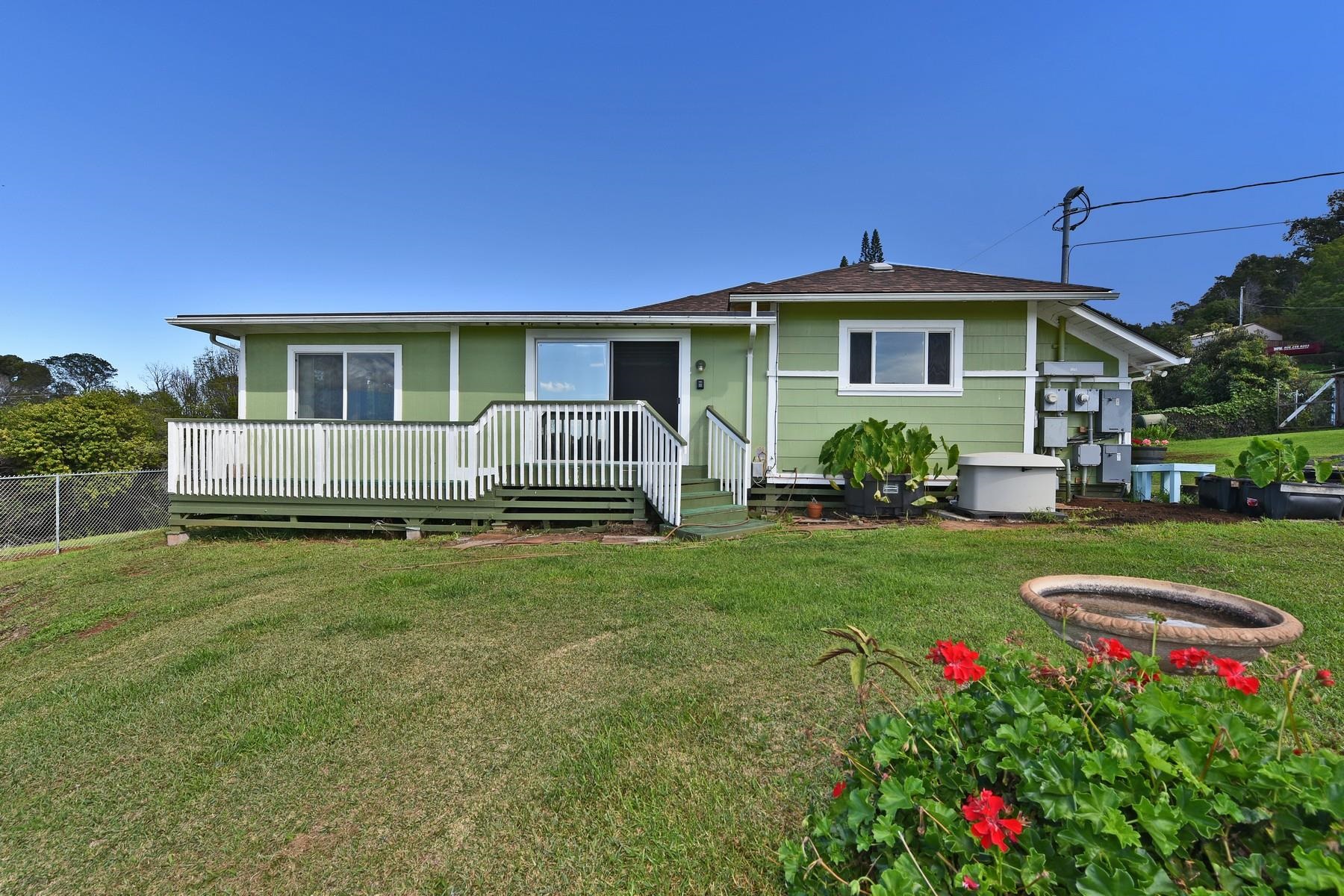 1145 Olinda Road Makawao, HI 96768 - Photo 1 of 30 a front view of a house with garden
