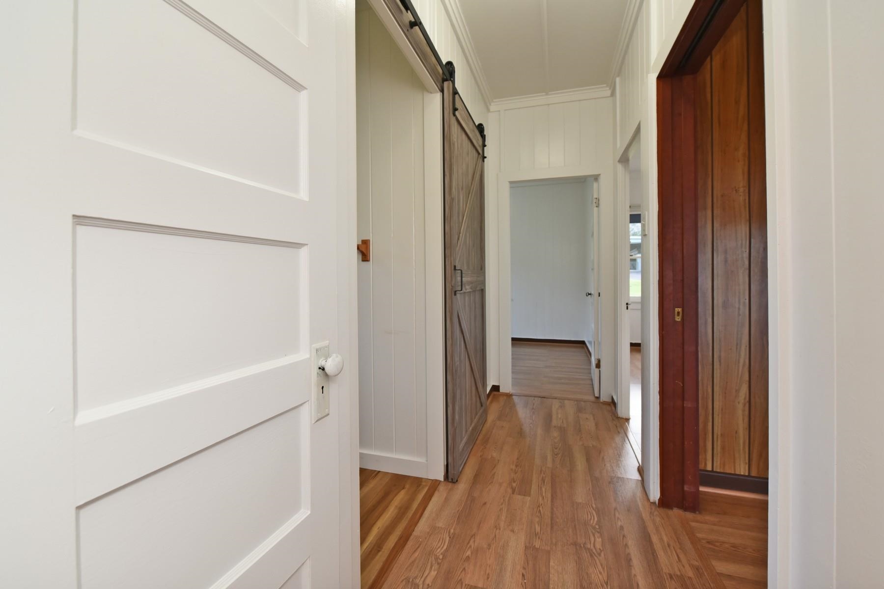 1145 Olinda Road Makawao, HI 96768 - Photo 14 of 30 a view of a hallway with wooden floor and closet