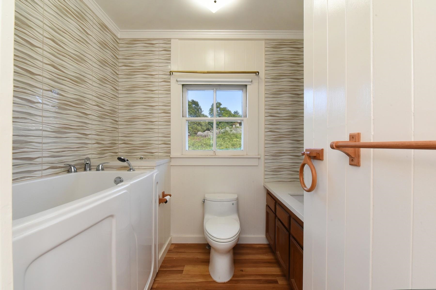 1145 Olinda Road Makawao, HI 96768 - Photo 15 of 30 a bathroom with a sink a toilet and bathtub
