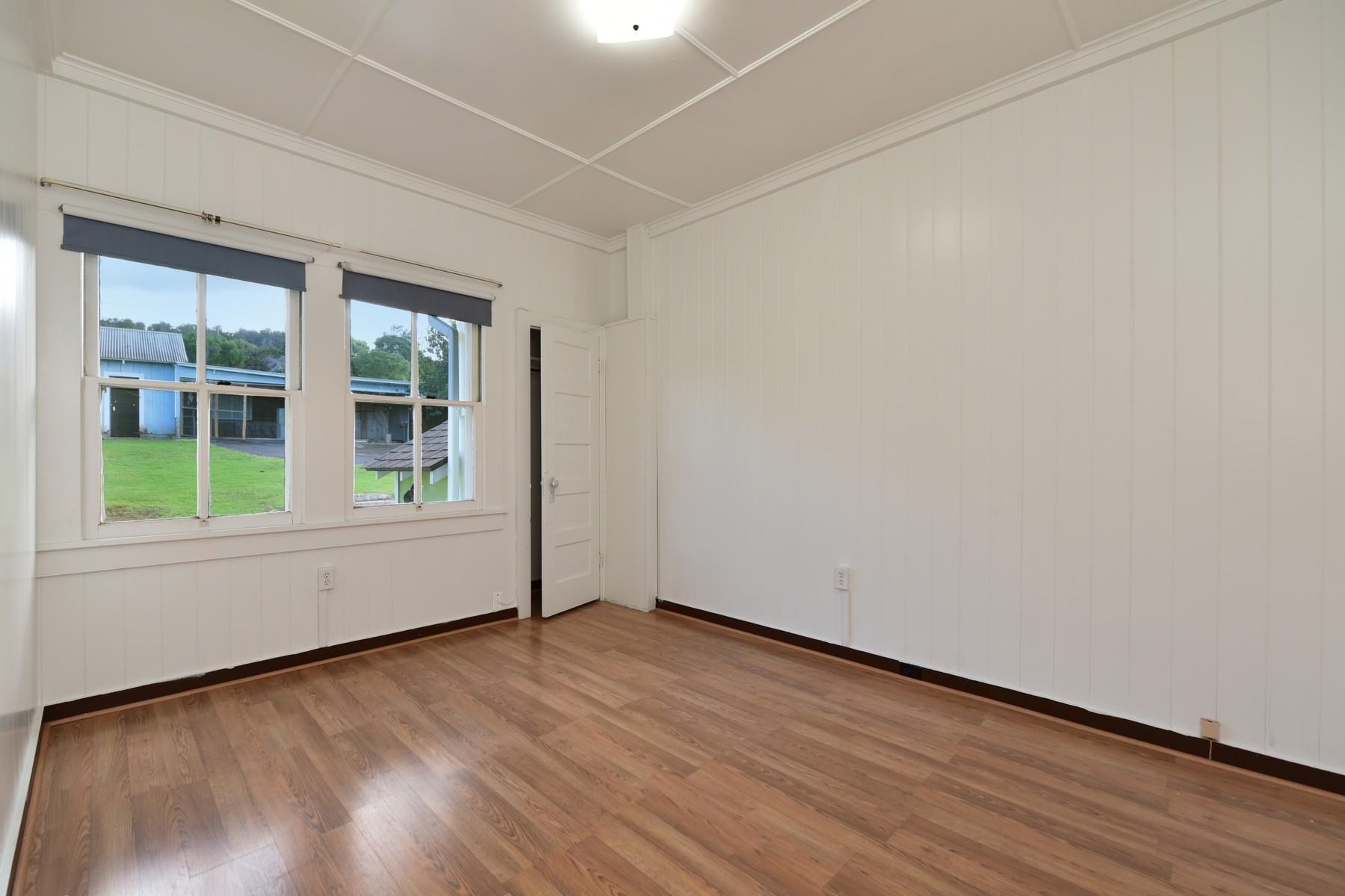 1145 Olinda Road Makawao, HI 96768 - Photo 20 of 30 a view of an empty room with wooden floor and windows