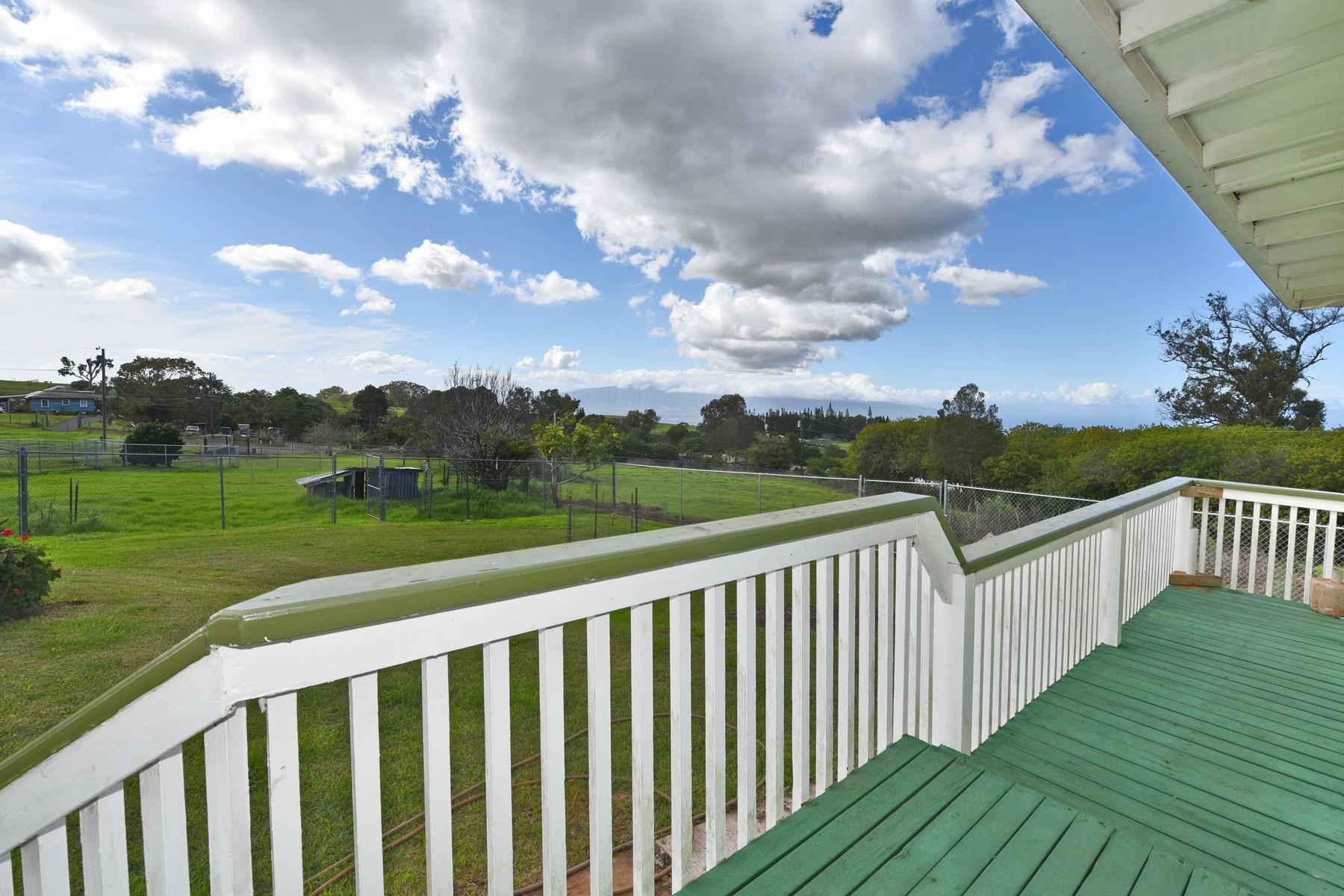 1145 Olinda Road Makawao, HI 96768 - Photo 6 of 30 a view of a balcony with wooden fence