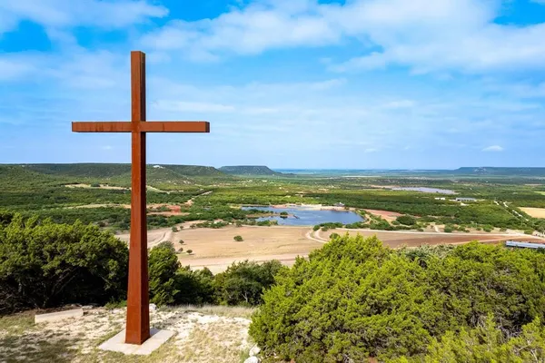a view of a water with a building in the background