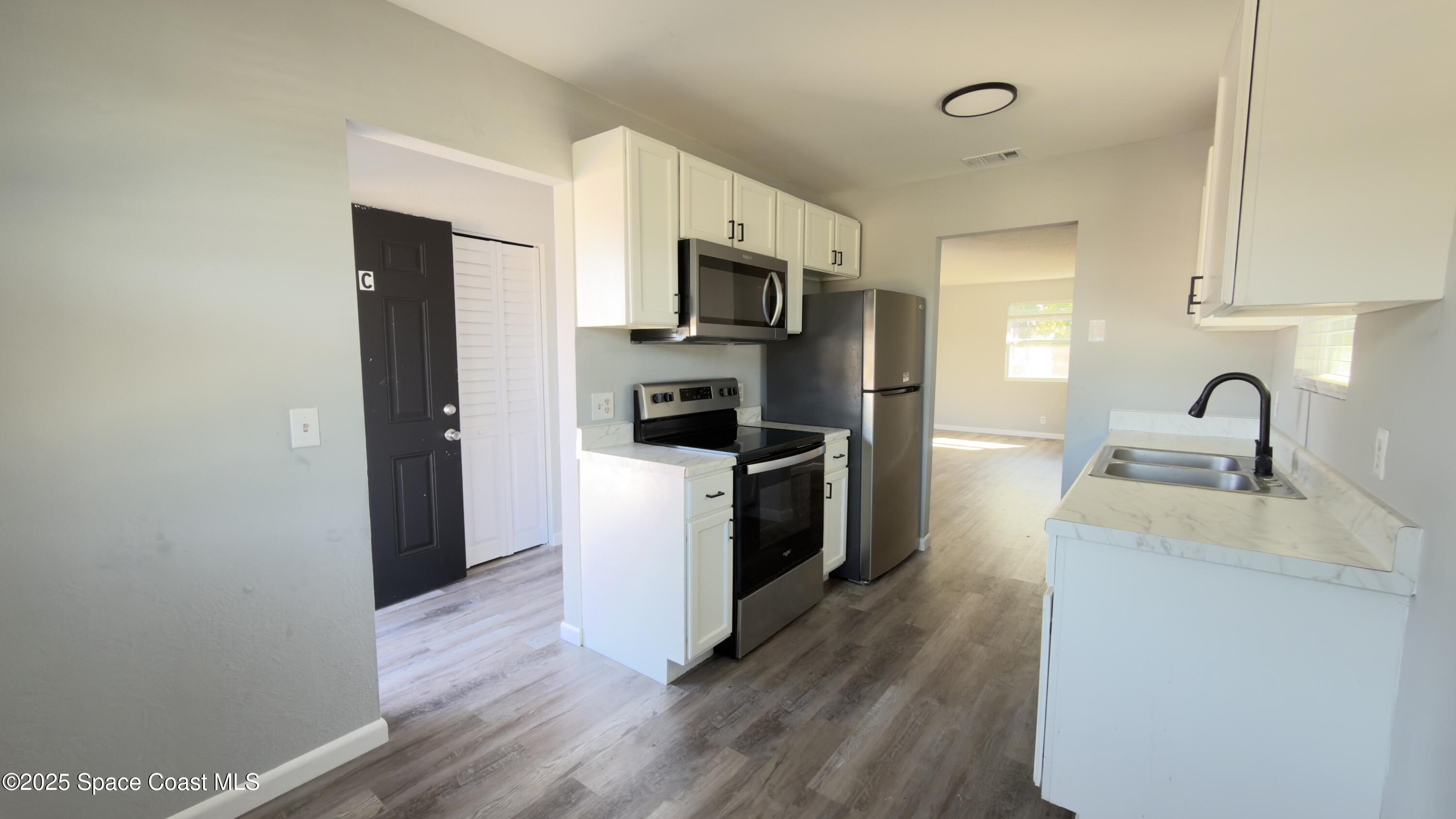 4160 Barna Avenue, Unit C Titusville, FL 32780 - Photo 2 of 14 Kitchen