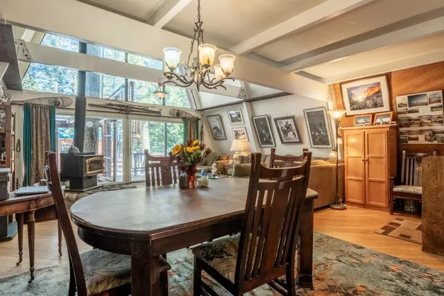 a kitchen with stainless steel appliances granite countertop a stove and cabinets