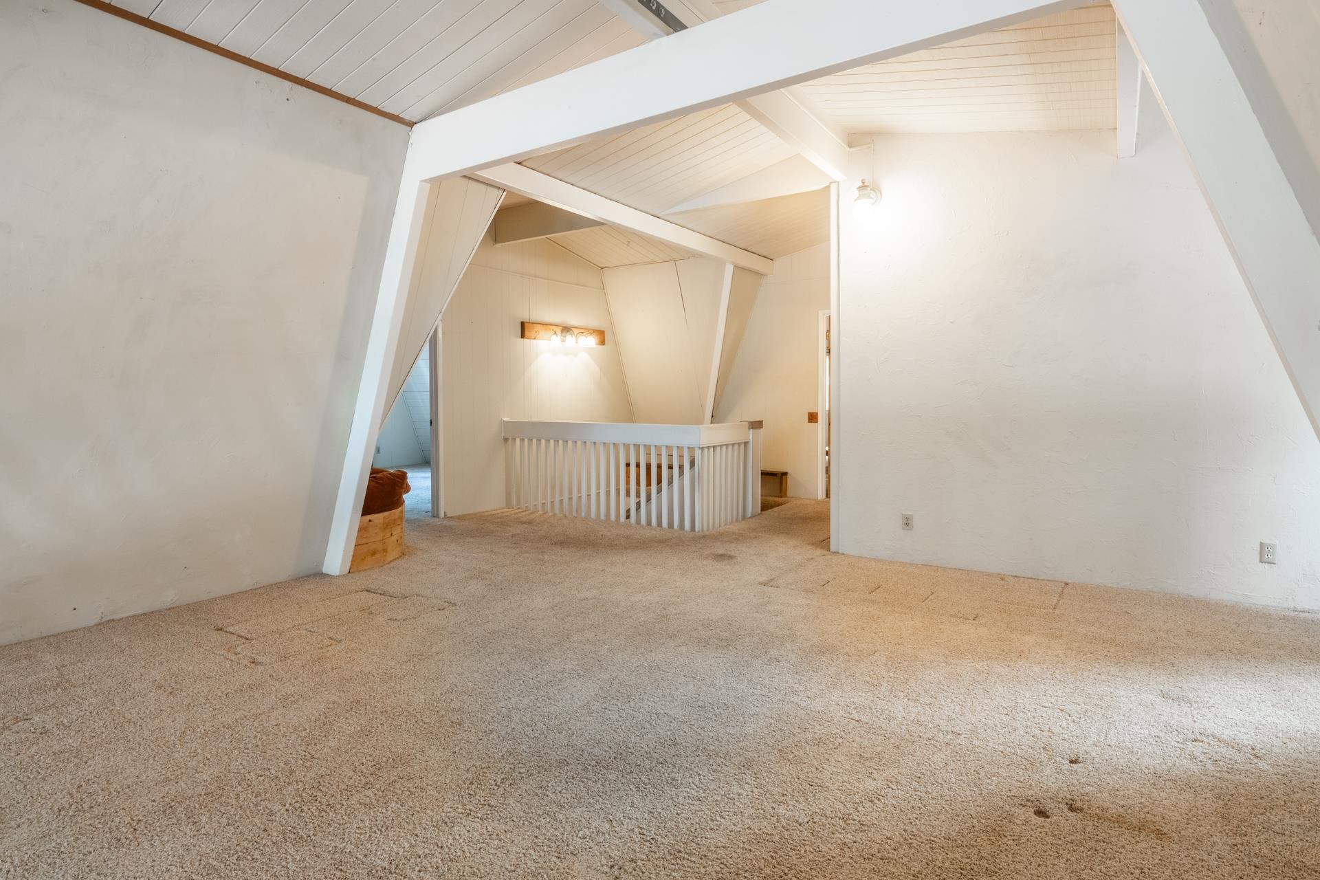 64 Mill Street Mammoth Lakes, CA 93546 - Photo 17 of 27 Bonus room featuring carpet floors and wood ceiling