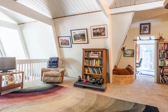a living room with a couch and a table