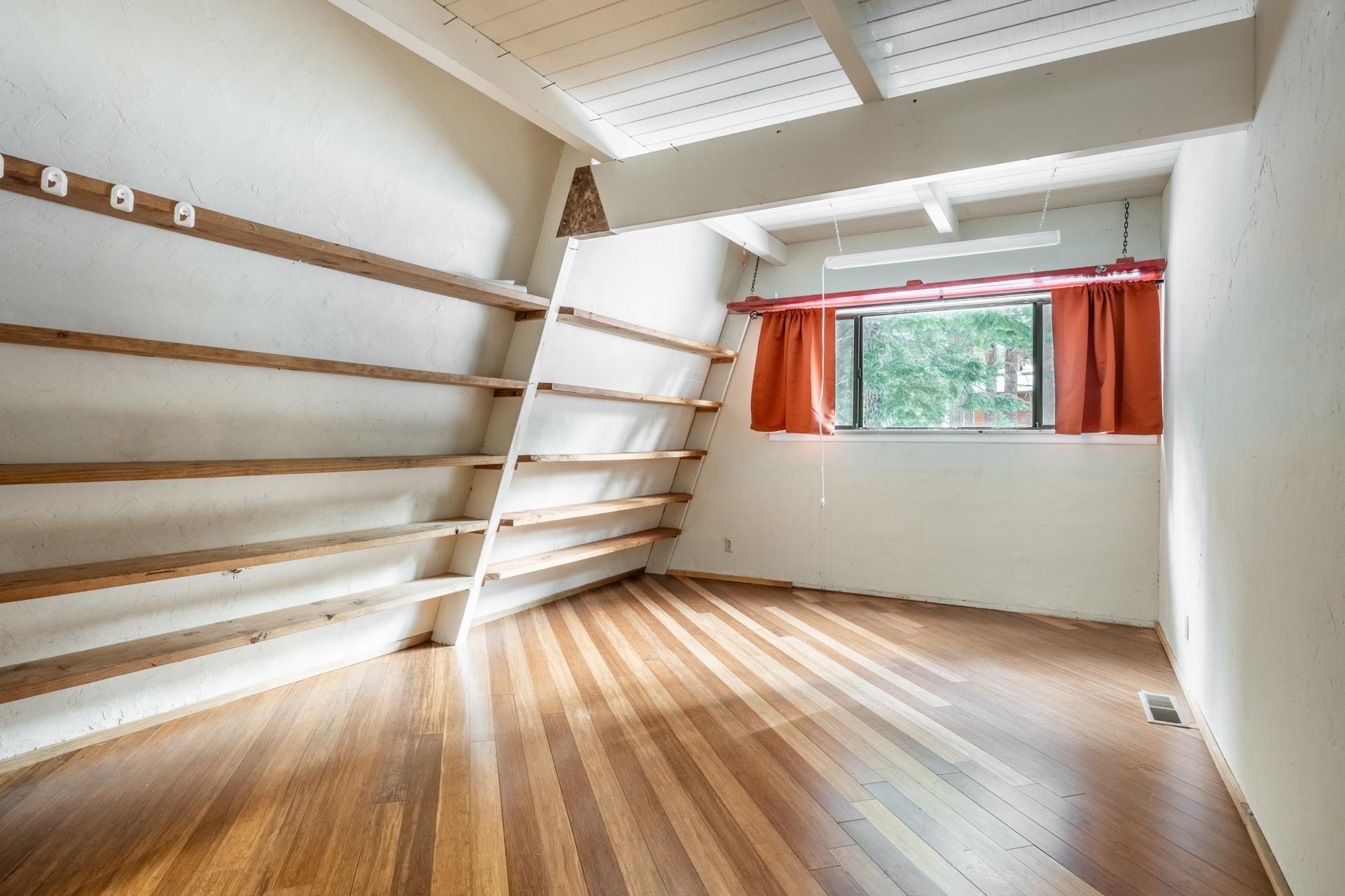 64 Mill Street Mammoth Lakes, CA 93546 - Photo 7 of 27 Empty room with hardwood / wood-style floors and wooden ceiling