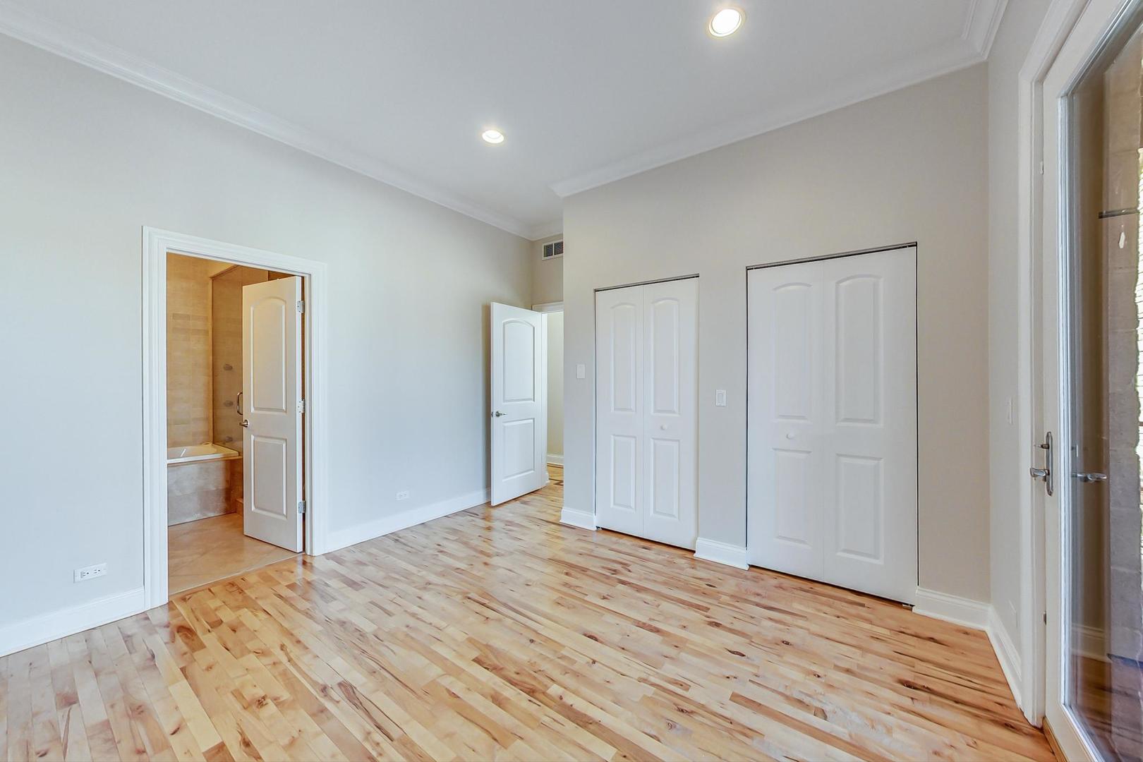 2448 West Augusta Boulevard, Unit 2 Chicago, IL 60622 - Photo 14 of 23 a view of a livingroom with wooden floor