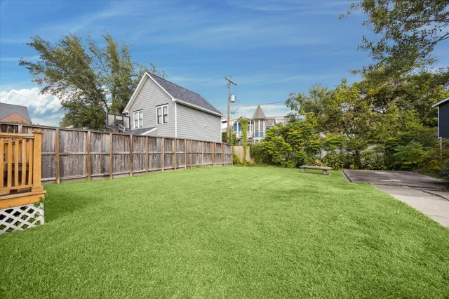 a view of a backyard with a garden