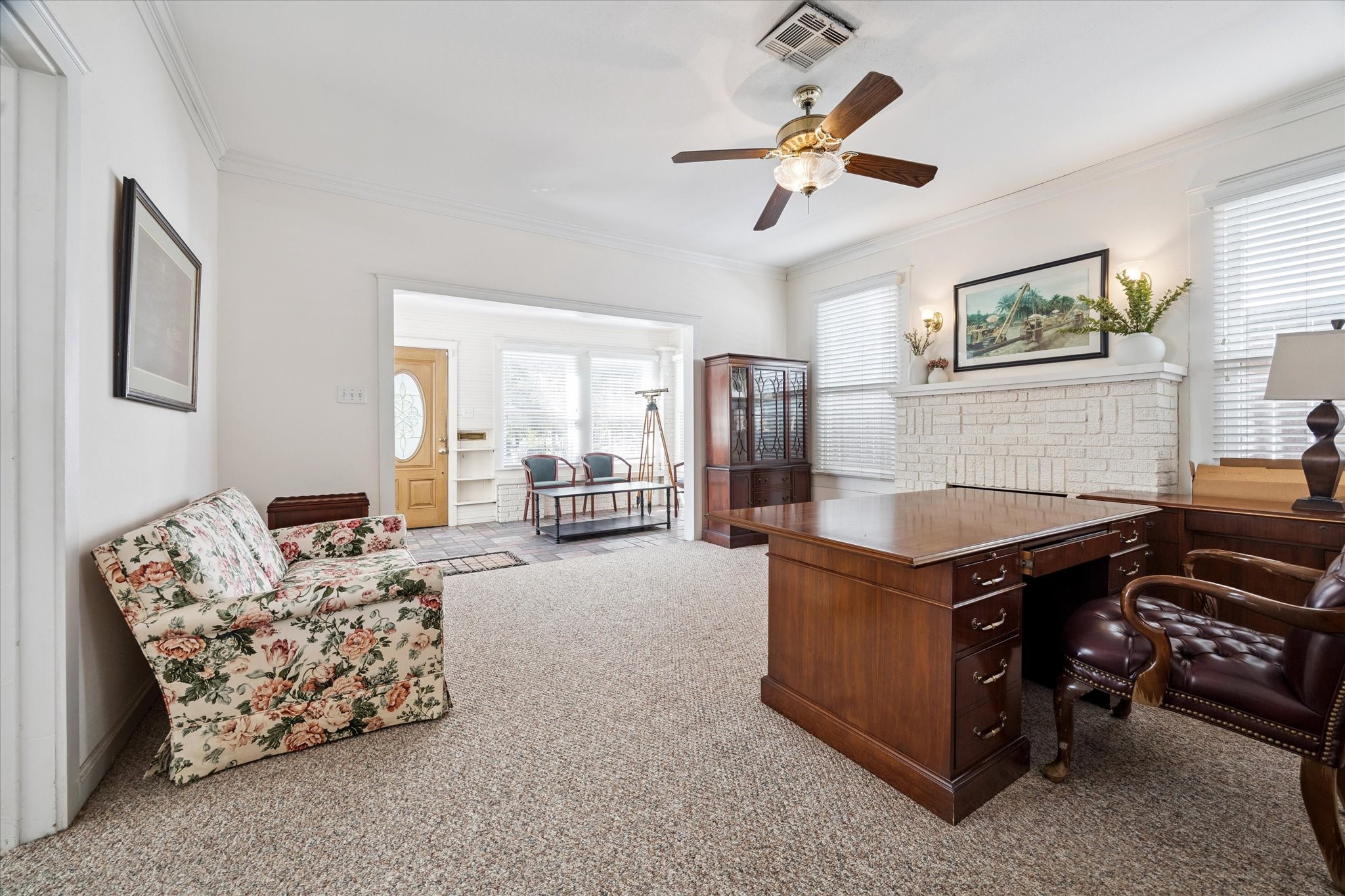 512 Heights Boulevard Houston, TX 77007 - Photo 6 of 12 a living room with furniture and a chandelier