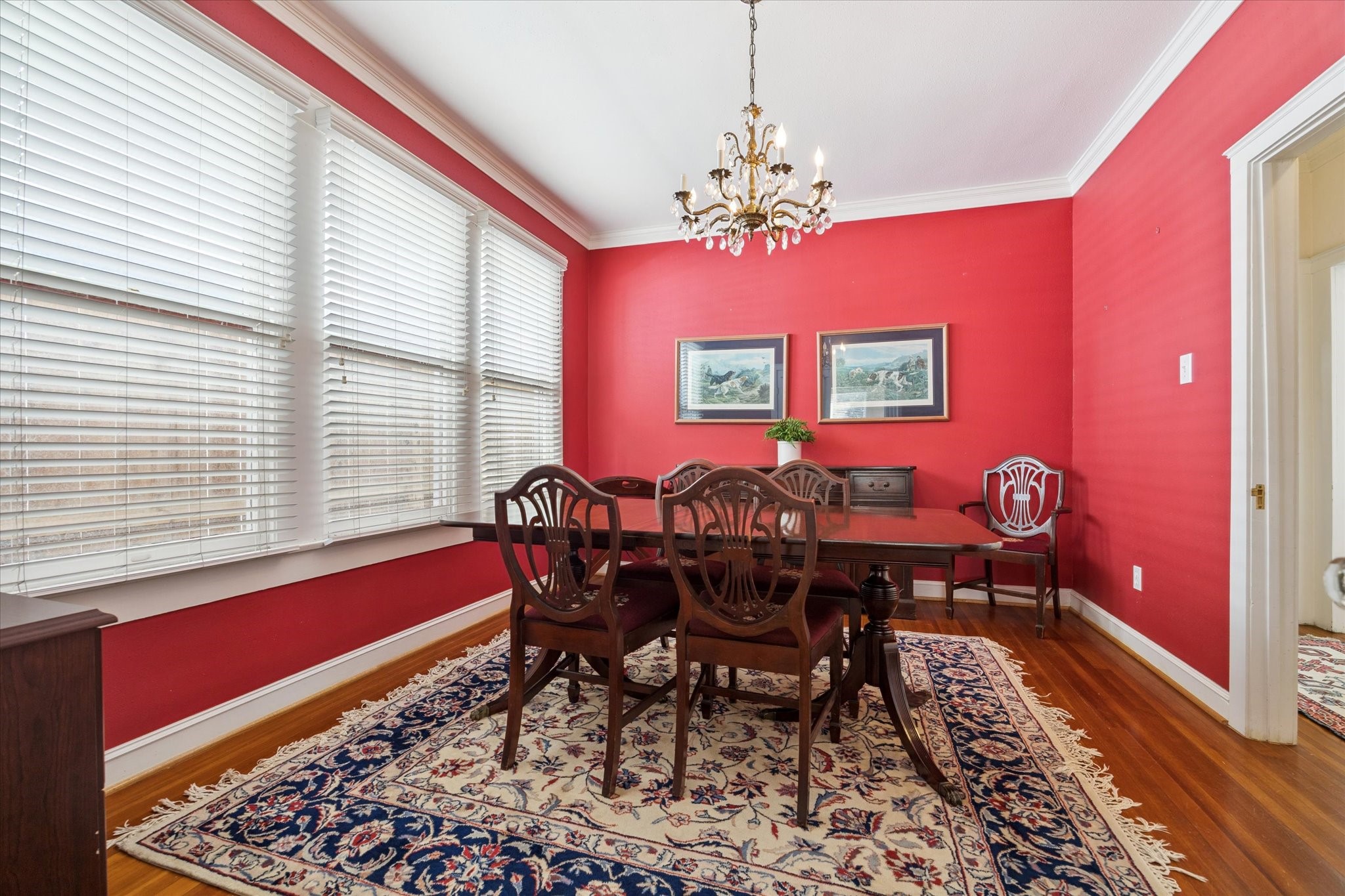 512 Heights Boulevard Houston, TX 77007 - Photo 7 of 12 a view of a dining room with furniture and chandelier