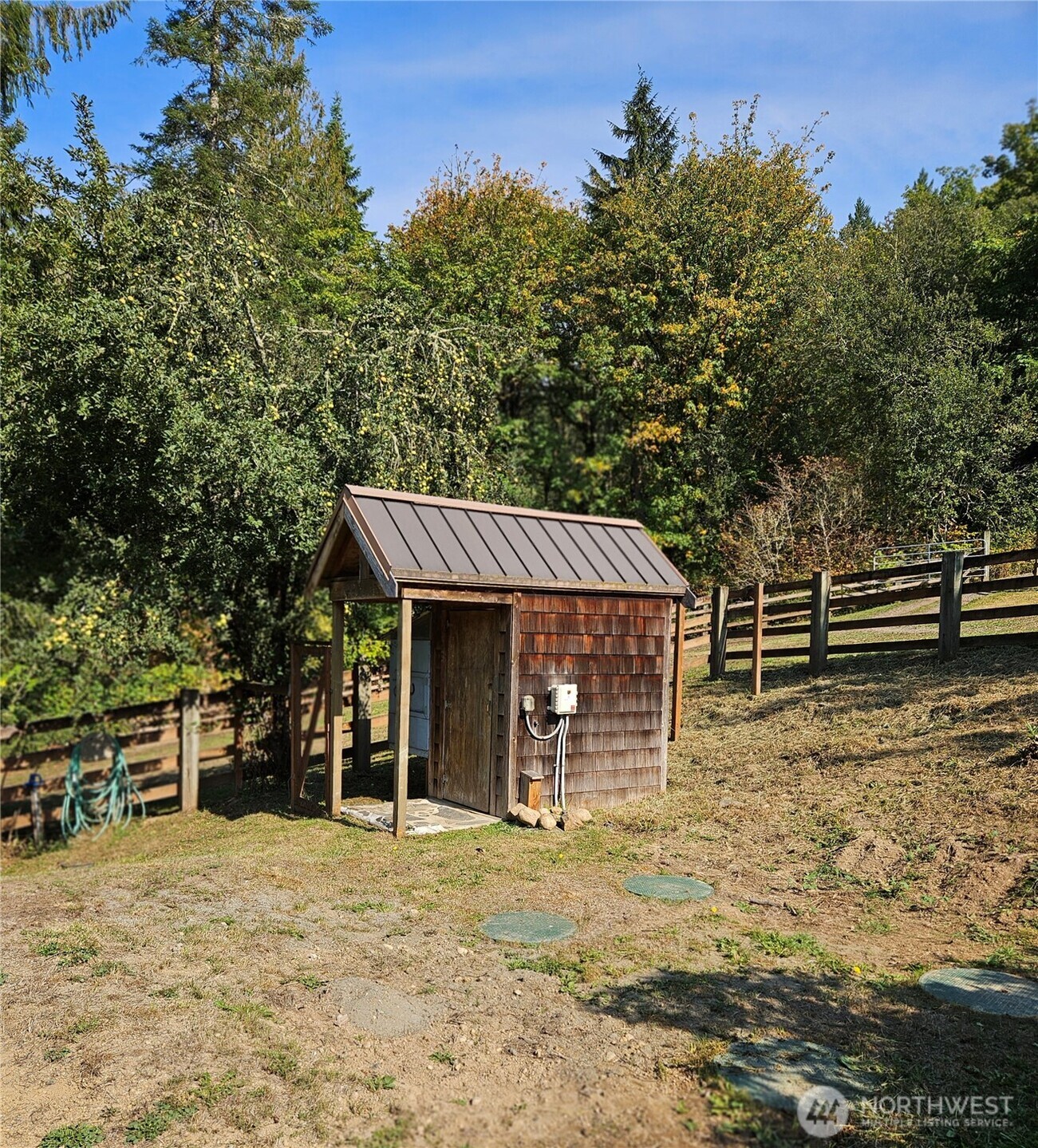 106 Crocker Lake Road Quilcene, WA 98376 - Photo 12 of 38 a front view of a house with garden