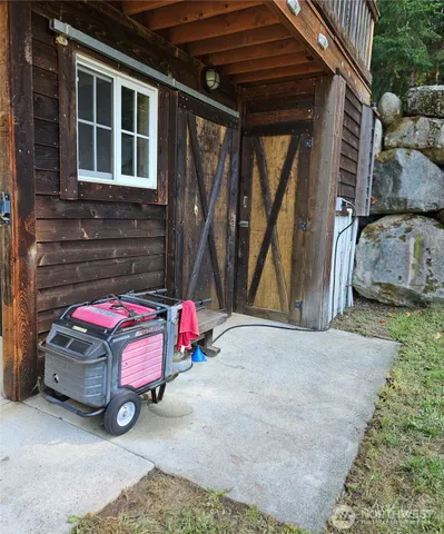 a view of a car park in front of house
