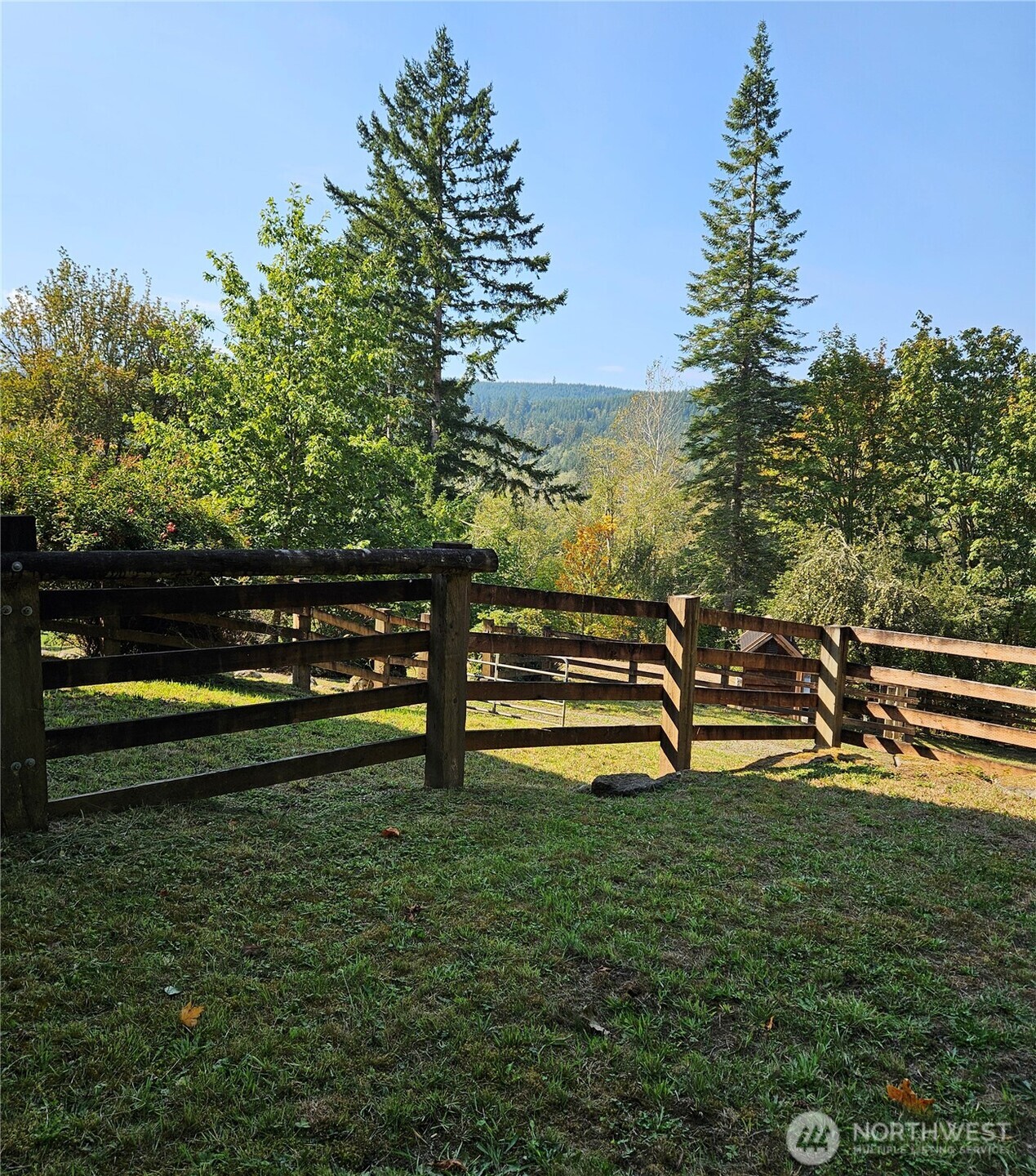 106 Crocker Lake Road Quilcene, WA 98376 - Photo 17 of 38 a view of a bench in the garden