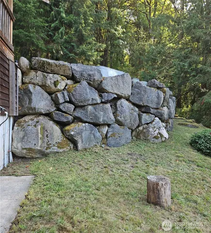 a backyard of a house with lots of green space