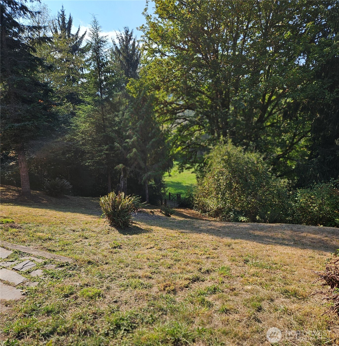 106 Crocker Lake Road Quilcene, WA 98376 - Photo 9 of 38 a view of a water fountain and small yard