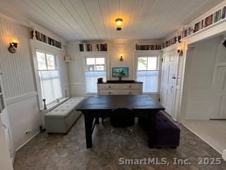 624 Vineyard Point Road Guilford, CT 06437 - Photo 11 of 38 a view of a workspace with furniture and window