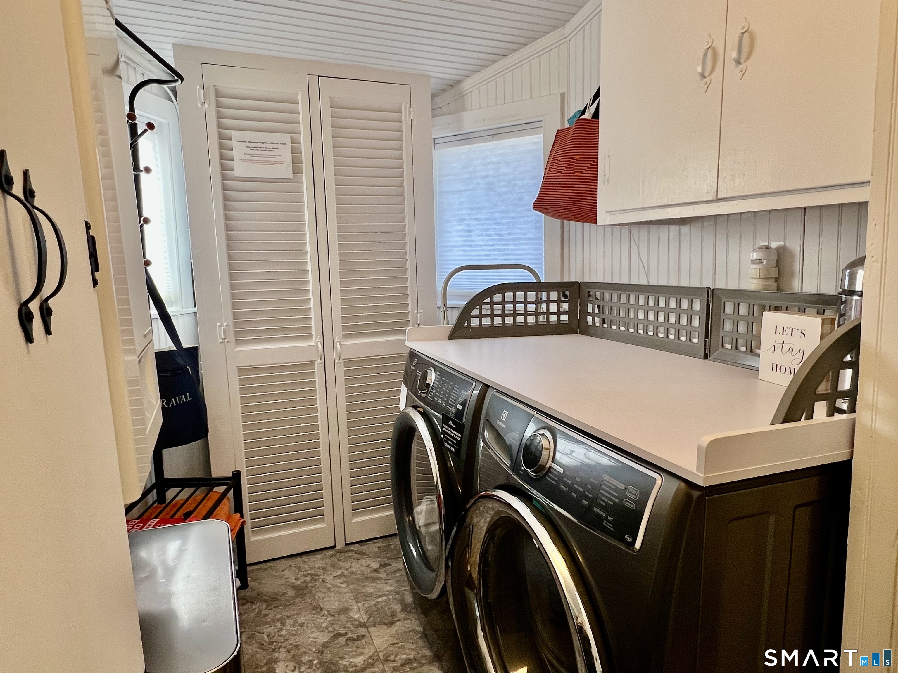 624 Vineyard Point Road Guilford, CT 06437 - Photo 11 of 40 a utility room with dryer and washer