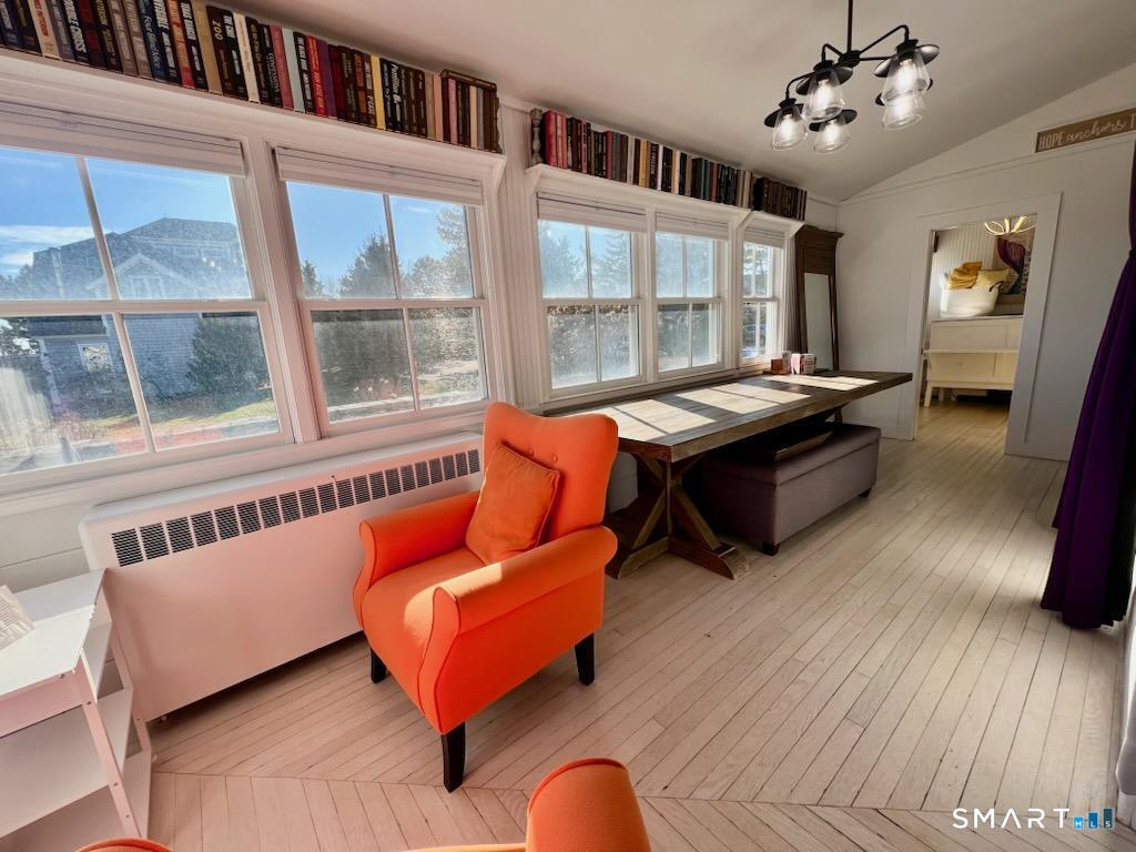 624 Vineyard Point Road Guilford, CT 06437 - Photo 13 of 40 a living room with furniture and a window