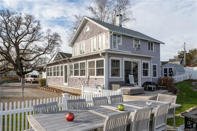 a house with trees in front of it