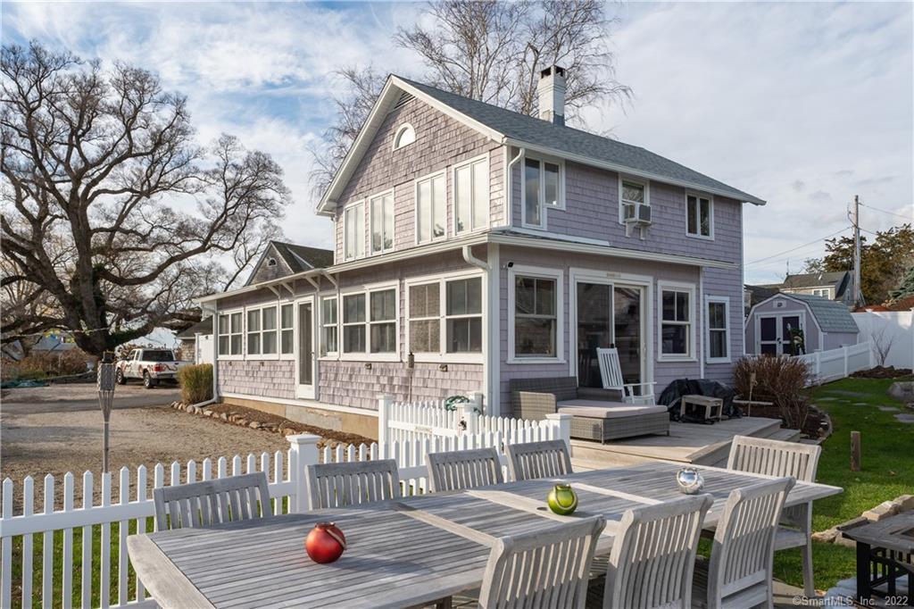 624 Vineyard Point Road Guilford, CT 06437 - Photo 29 of 38 a view of a house with pool and sitting area