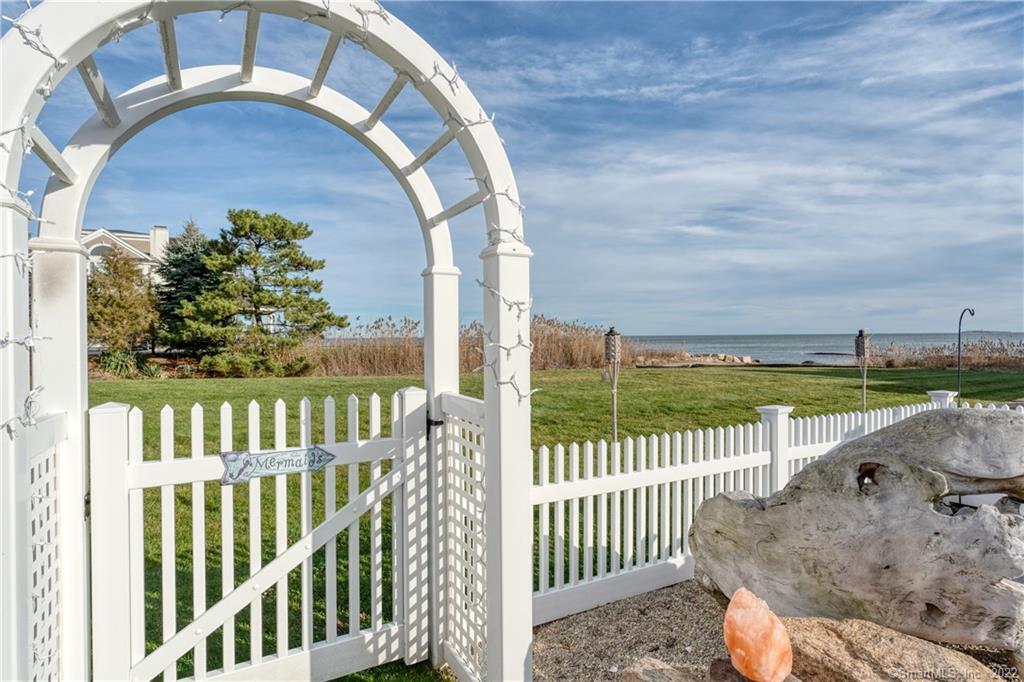 624 Vineyard Point Road Guilford, CT 06437 - Photo 31 of 38 a view of a porch with a yard